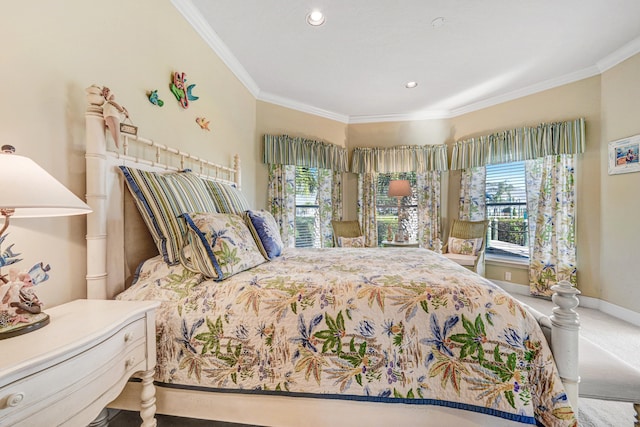 carpeted bedroom featuring crown molding