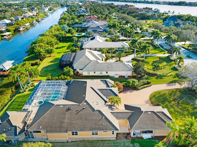aerial view featuring a residential view and a water view