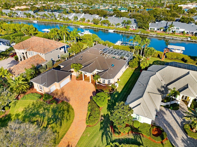 aerial view with a water view and a residential view