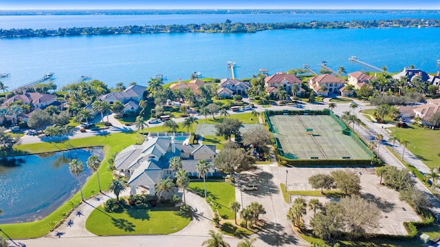 birds eye view of property with a residential view and a water view