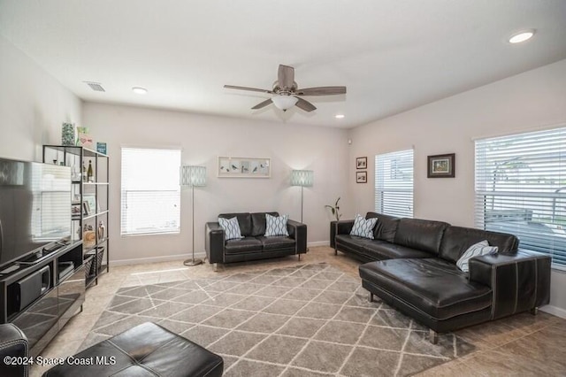 living room featuring recessed lighting, visible vents, baseboards, and ceiling fan