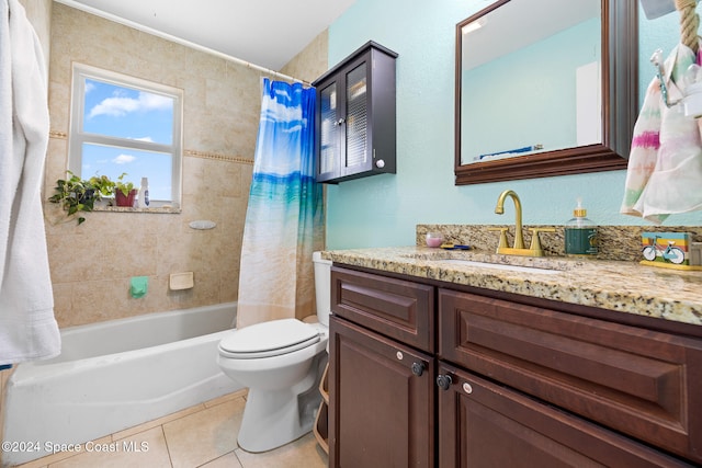 full bathroom with vanity, toilet, tile patterned floors, and shower / tub combo