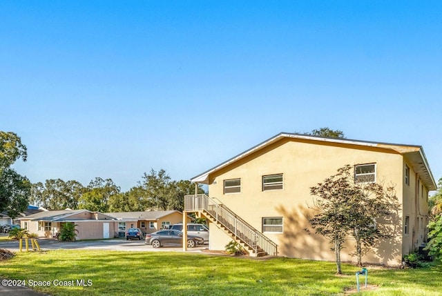 exterior space featuring a yard