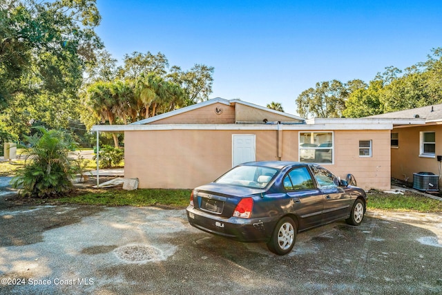 view of property exterior with cooling unit