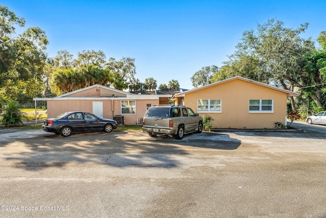 ranch-style home with central AC