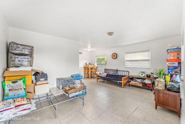 living area with light tile patterned floors