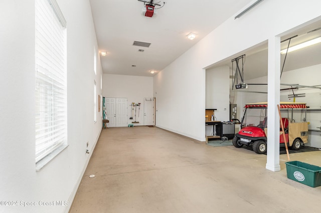 garage featuring a garage door opener