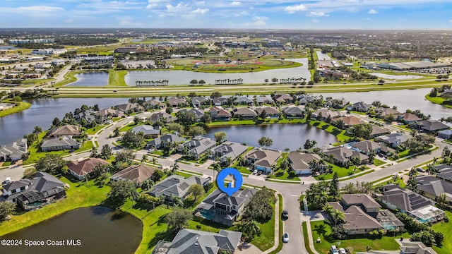 drone / aerial view featuring a water view