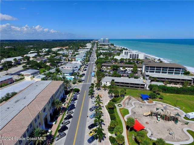 aerial view featuring a view of the beach and a water view