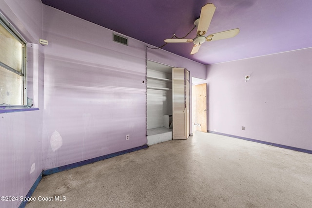 unfurnished bedroom featuring a closet and ceiling fan