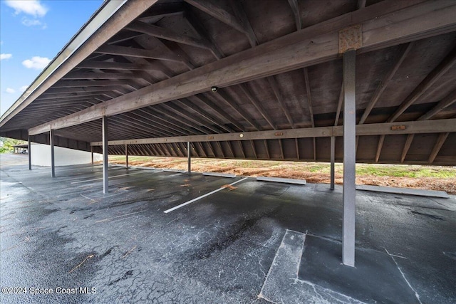 view of parking featuring a carport