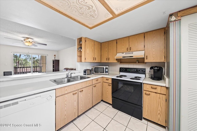 kitchen featuring decorative backsplash, kitchen peninsula, white appliances, sink, and light tile patterned floors