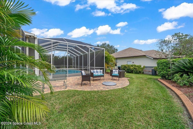 view of yard featuring a lanai and a patio