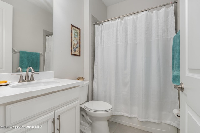 full bathroom with toilet, shower / tub combo with curtain, vanity, and tile patterned flooring