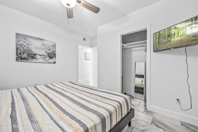 3524 S Atlantic Ave, Cocoa Beach, FL 32931 - bedroom with light marble finish flooring and ceiling fan