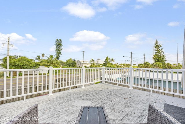 3524 S Atlantic Ave, Cocoa Beach, FL 32931 - view of patio with fence