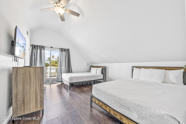 3524 S Atlantic Ave, Cocoa Beach, FL 32931 - bedroom with lofted ceiling, access to exterior, wood finished floors, and a ceiling fan