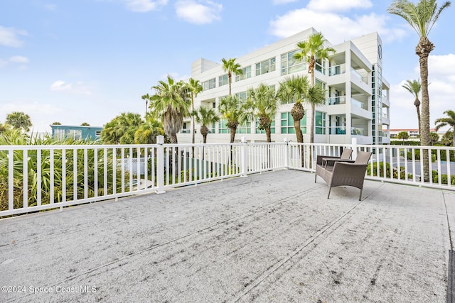 3524 S Atlantic Ave, Cocoa Beach, FL 32931 - view of patio featuring fence
