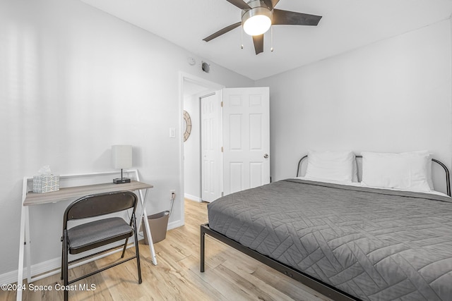 3524 S Atlantic Ave, Cocoa Beach, FL 32931 - bedroom featuring wood finished floors, baseboards, and a ceiling fan