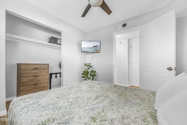 3524 S Atlantic Ave, Cocoa Beach, FL 32931 - bedroom with baseboards and a ceiling fan