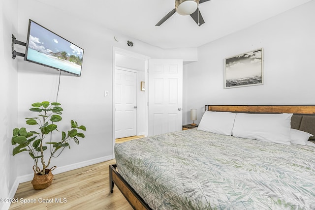 3524 S Atlantic Ave, Cocoa Beach, FL 32931 - bedroom featuring wood finished floors, baseboards, and ceiling fan