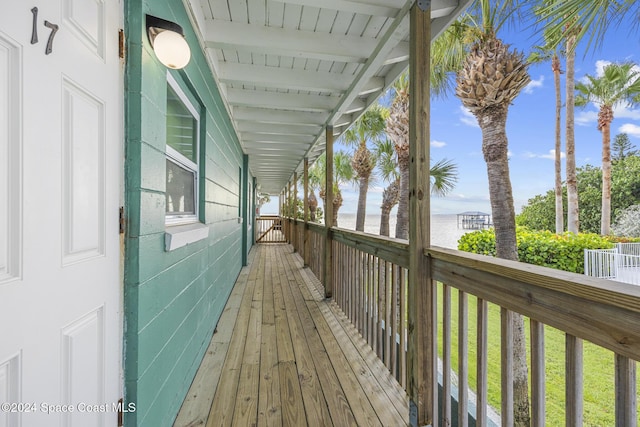 3524 S Atlantic Ave, Cocoa Beach, FL 32931 - wooden deck featuring a water view