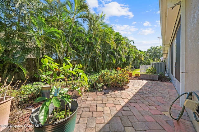 view of patio with central AC