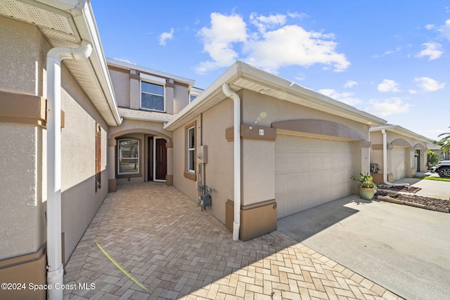 exterior space featuring a garage