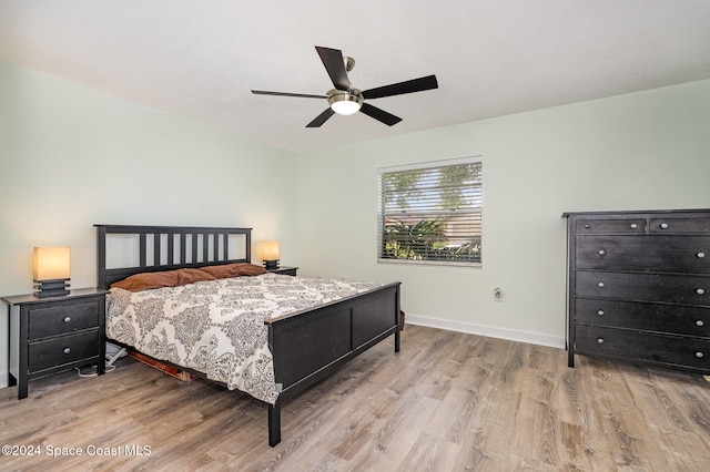 bedroom with light wood-type flooring and ceiling fan