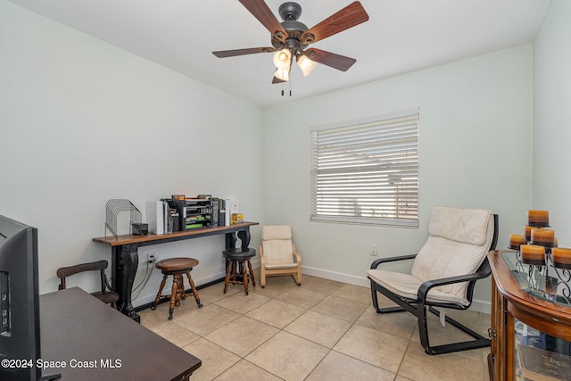 office area featuring light tile patterned floors and ceiling fan