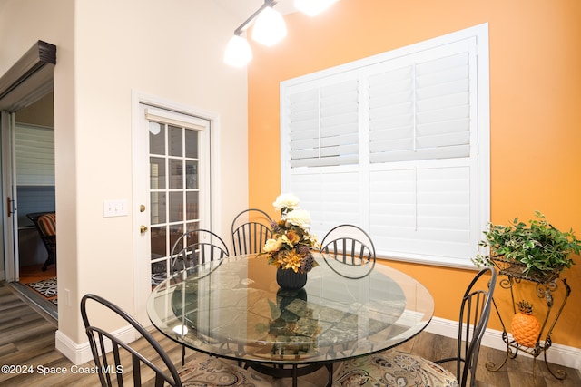 dining area featuring wood-type flooring