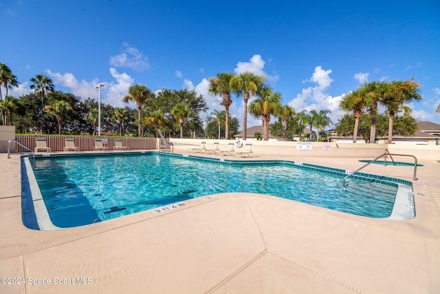 view of pool with a patio area