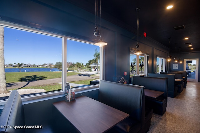 view of carpeted dining space