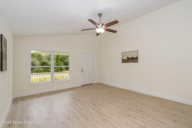 unfurnished room featuring high vaulted ceiling, light wood-type flooring, and ceiling fan