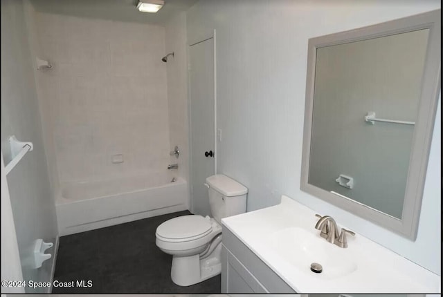 full bathroom with vanity, toilet, and tiled shower / bath