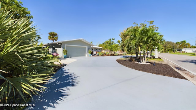 exterior space with a garage