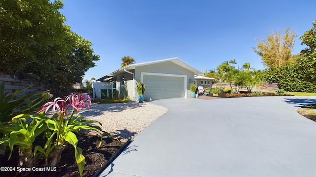 view of front of property with a garage