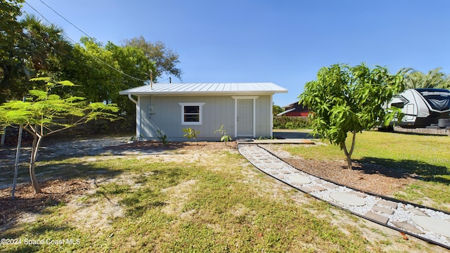 exterior space with a lawn