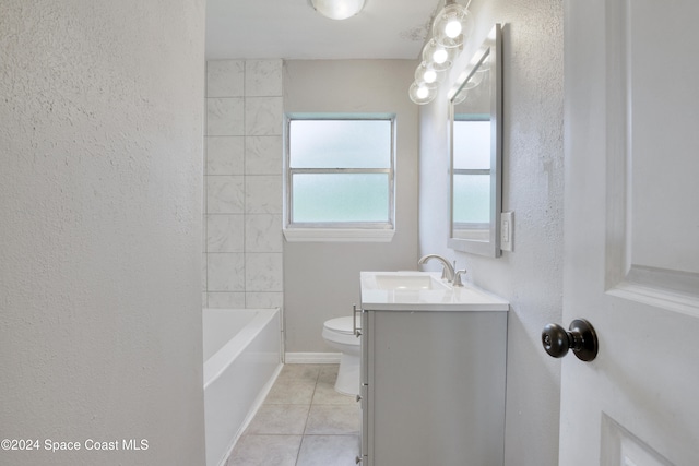 bathroom with tile patterned flooring, vanity, and toilet