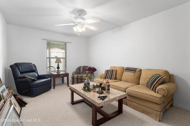 living room with carpet floors and ceiling fan