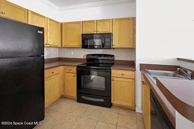 6440 Borasco Dr Unit 1502, Melbourne, FL 32940 - kitchen featuring black appliances, crown molding, backsplash, and light tile patterned flooring