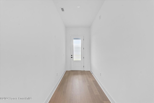 doorway to outside featuring light wood-type flooring