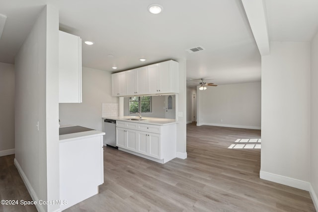 kitchen with dishwasher, sink, ceiling fan, light hardwood / wood-style floors, and white cabinetry