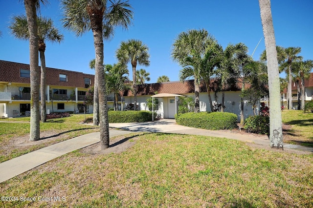 view of front of home with a front yard