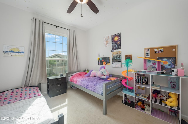 bedroom featuring ceiling fan and carpet floors