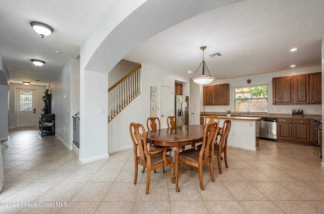 dining room featuring light tile patterned floors