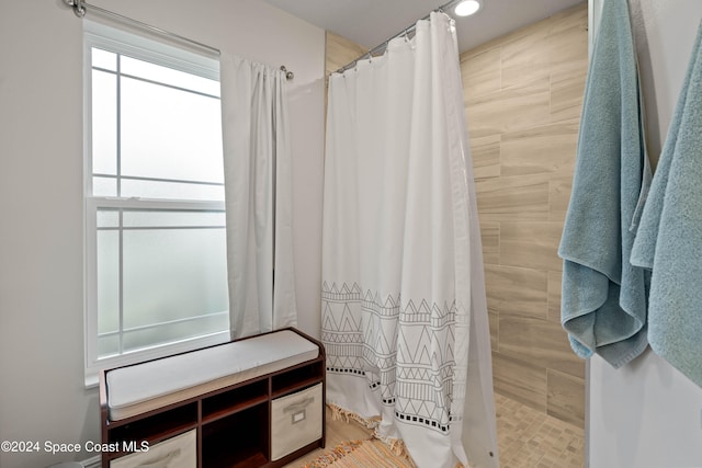 bathroom with walk in shower