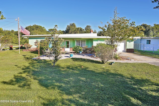 view of front of home with a front yard