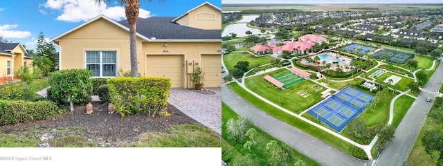 view of front of home featuring a garage and a front lawn