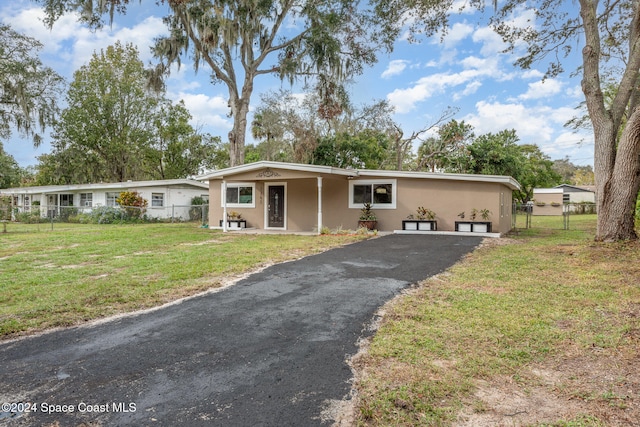 view of front of home with a front yard